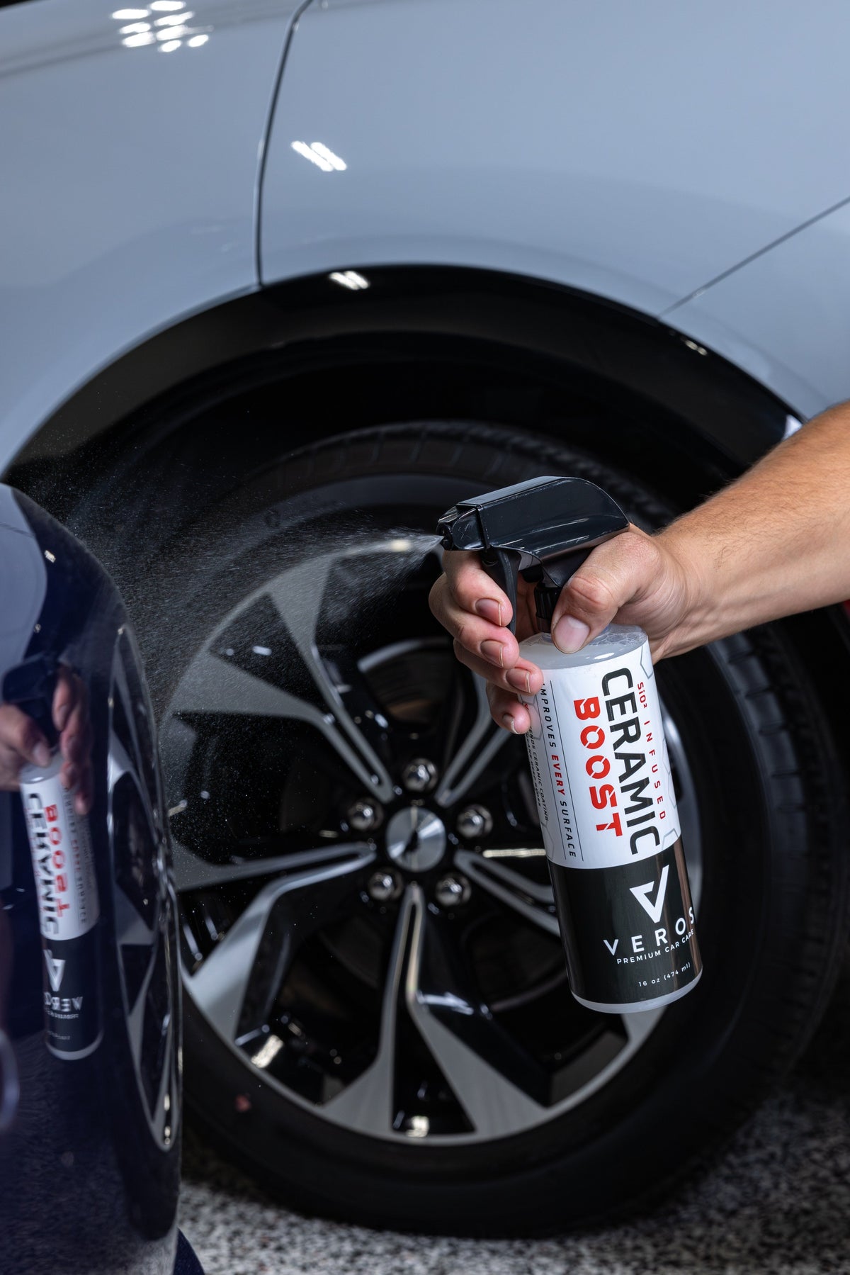 Spraying Ceramic Boost on a wheel