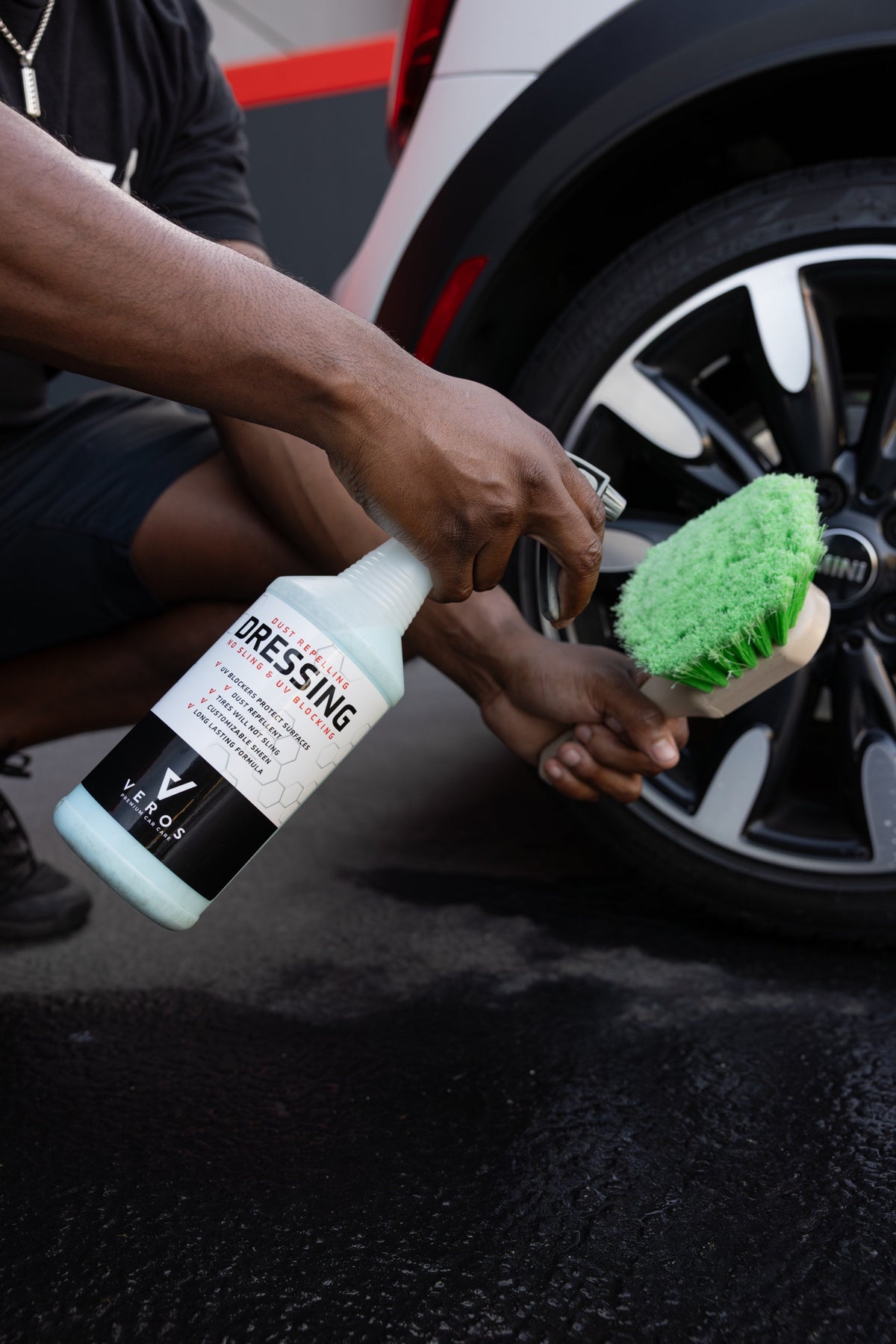 Applying No-Sling Dressing with the tire brush