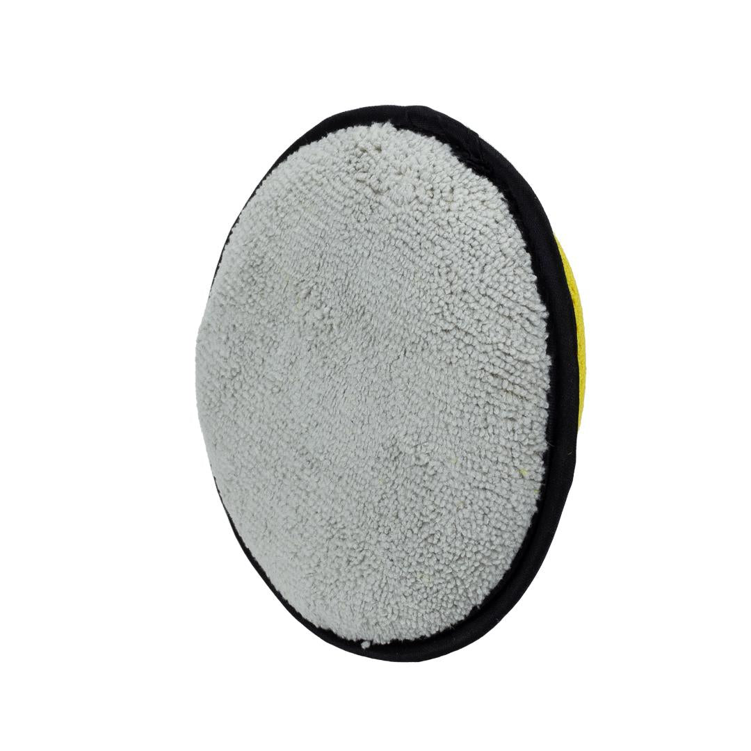 Veros Dressing and Wax Applicator Pad in hand