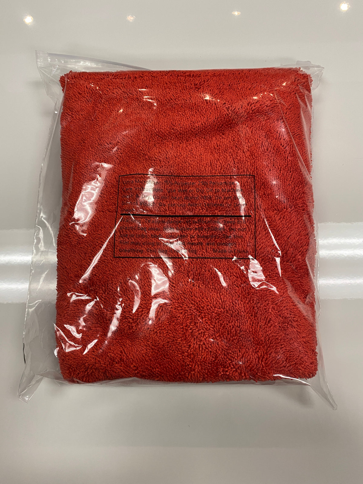 Veros 1100 GSM drying towel drying a car