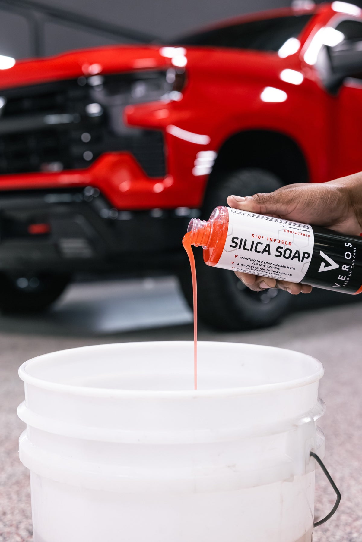 Pouring Silica Soap into a bucket