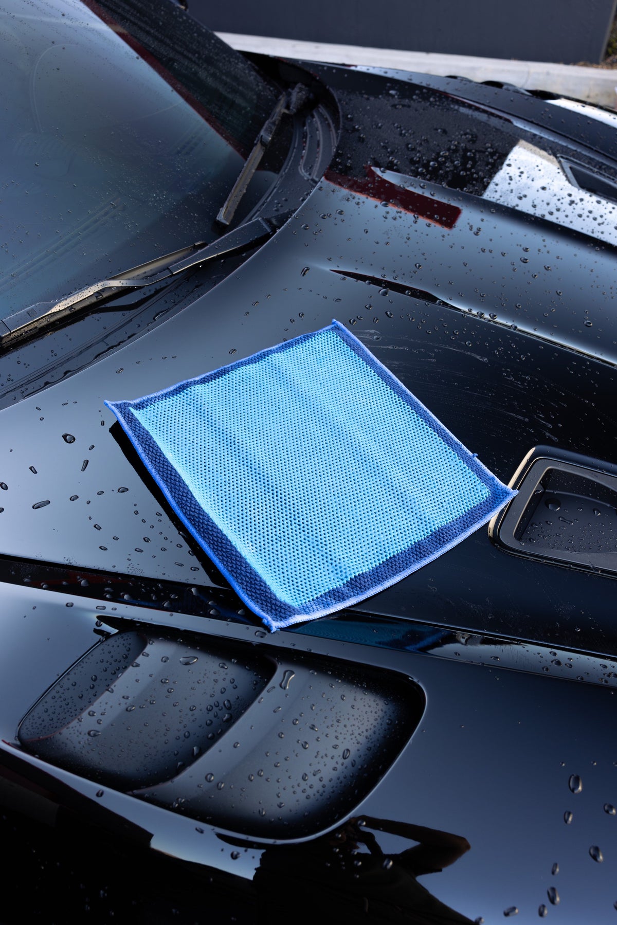 Veros Fine Grade Clay Pad on a Porsche hood